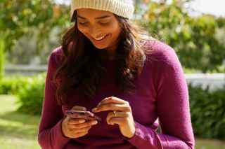 Image of a woman using a mobile phone